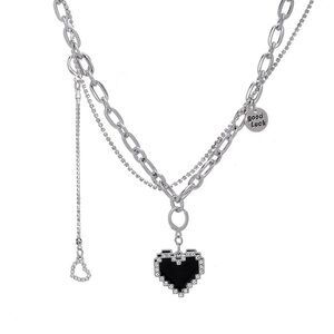 Urban Outfitters Silver and Black Heart Pendant Necklace
